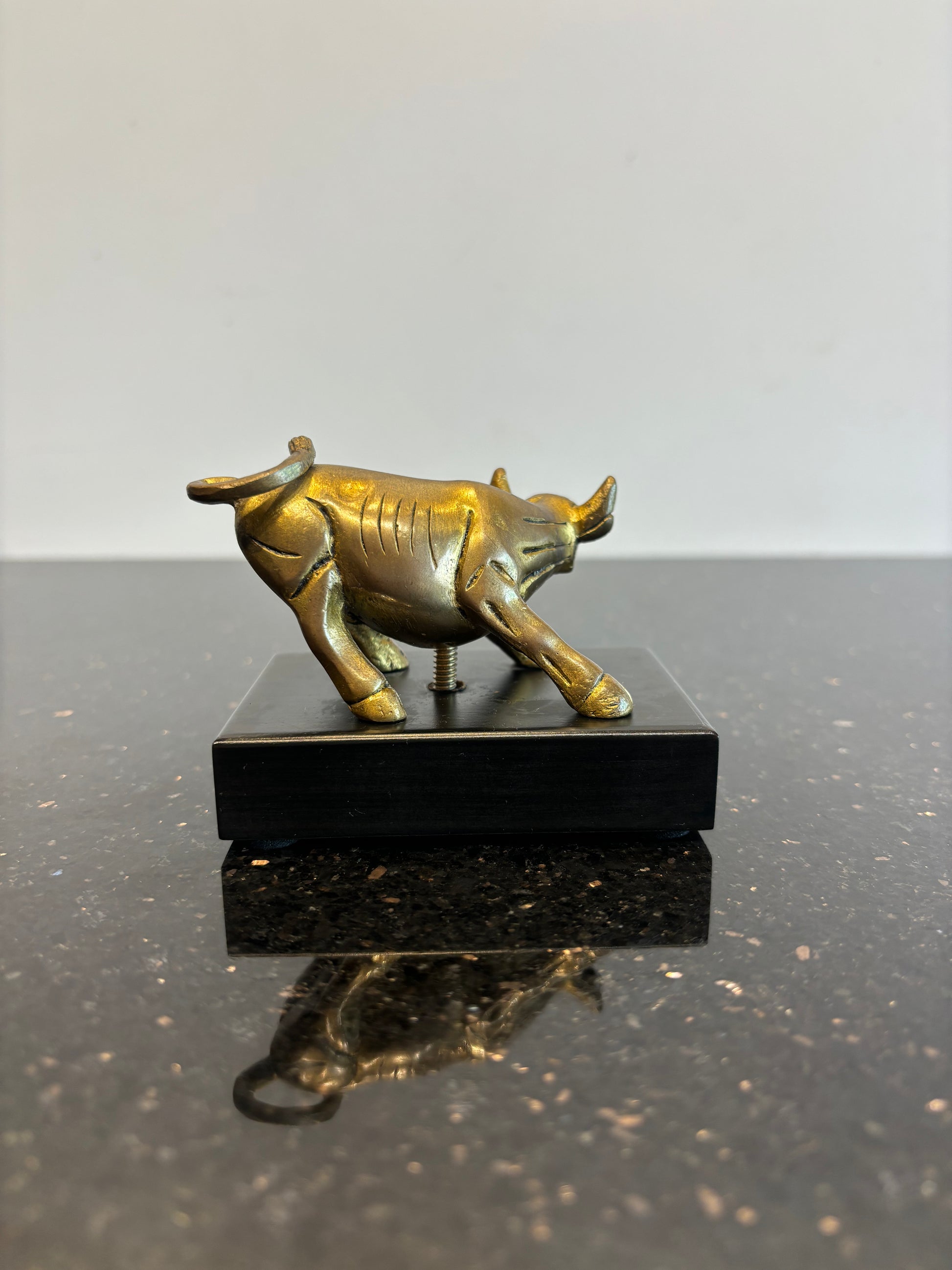 Bull with wooden board