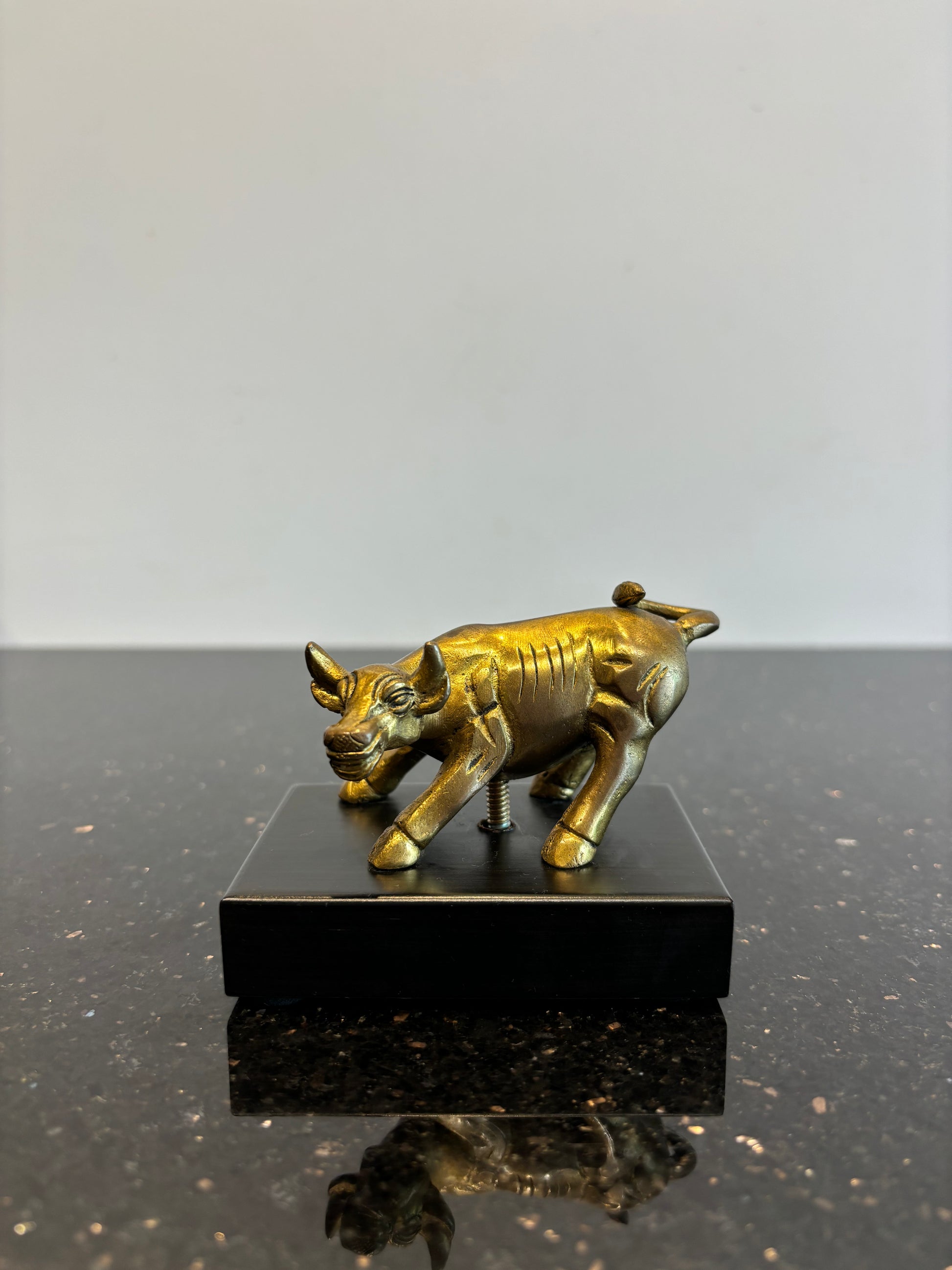 Bull with wooden board