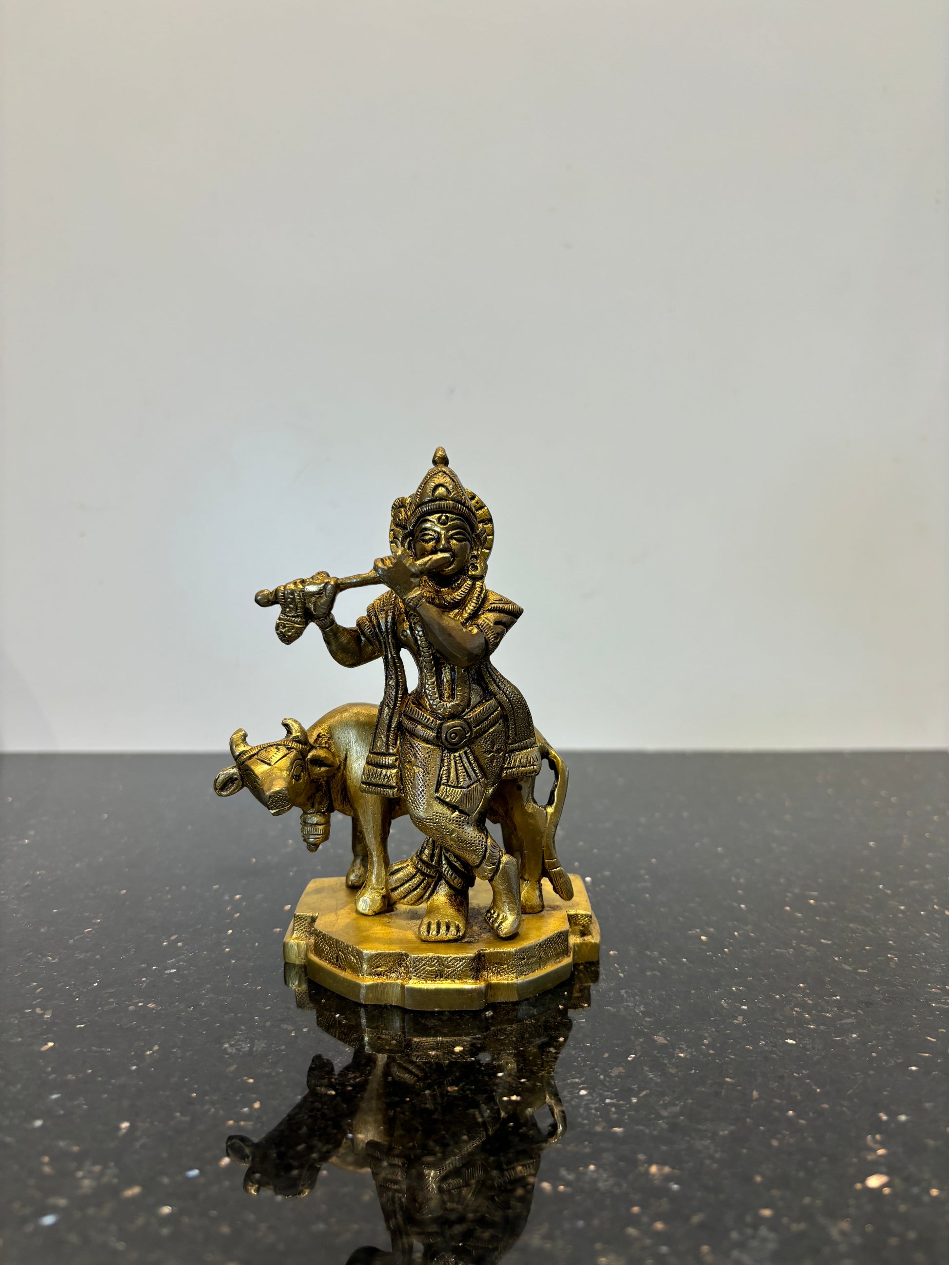 Krishna with flute cow
